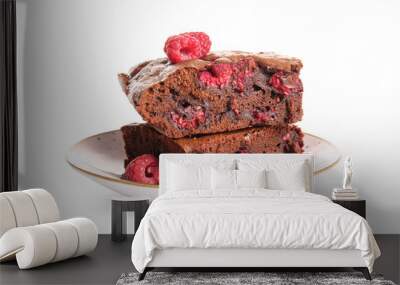 Plate with pieces of raspberry chocolate brownie on white background Wall mural