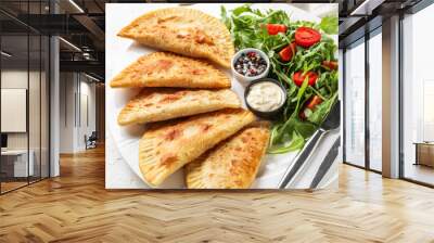 Plate with tasty chebureks and salad on light background, closeup Wall mural