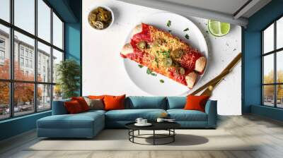 Plate with tasty cooked enchilada on white background Wall mural