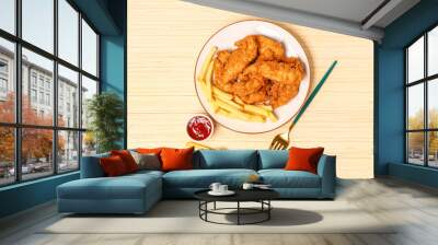 Plate with tasty nuggets, french fries and sauce on wooden background Wall mural