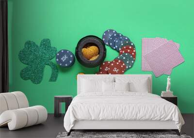 poker chips, pot with coins, cards and clover on green background. st. patrick's day celebration Wall mural