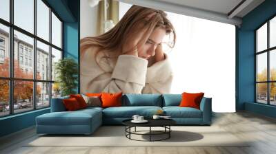 Portrait of depressed woman at home Wall mural