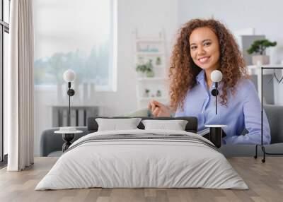 Portrait of female African-American psychologist in office Wall mural