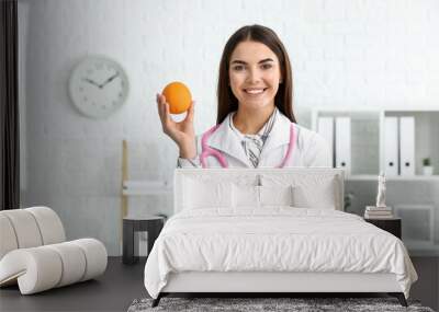 Portrait of female nutritionist in her office Wall mural