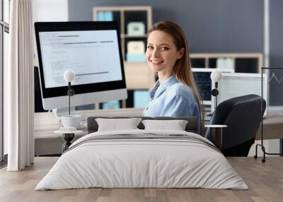 portrait of female programmer in office Wall mural