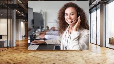 Portrait of female technical support agent in office Wall mural