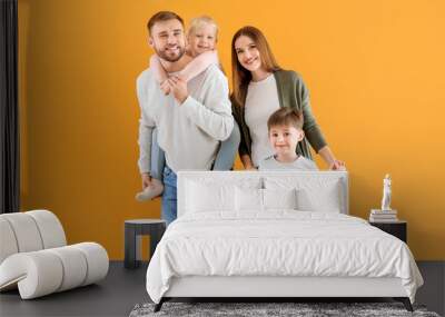 Portrait of happy family on color background Wall mural