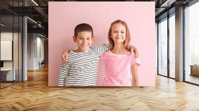 Portrait of happy little children on color background Wall mural