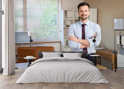 Portrait of male accountant in office Wall mural