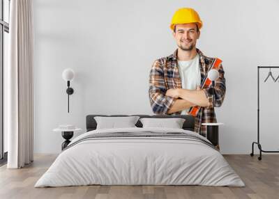 Portrait of male architect on light background Wall mural