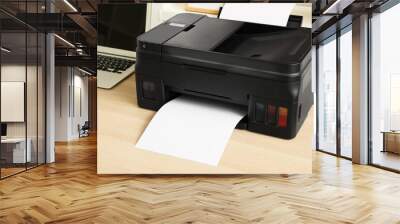 printer with paper on table, closeup Wall mural