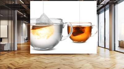 Process of making tea in glass cup on white background Wall mural