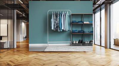 Rack with stylish clothes and shoes in dressing room Wall mural