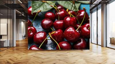 Ripe cherries with water drops on table, closeup Wall mural