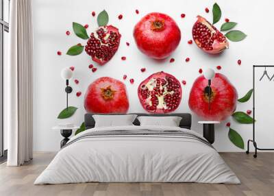 Ripe tasty pomegranates on white background Wall mural