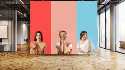 Set of beautiful Indian women on color background Wall mural