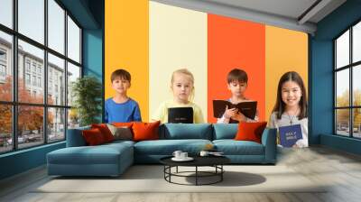 Set of children with Bible on color background Wall mural