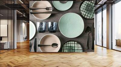 Set of clean tableware on grey background Wall mural