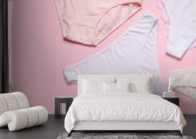 Set of cotton female panties on pink background Wall mural