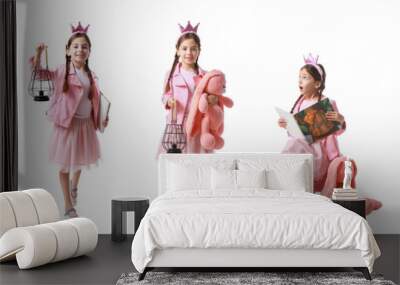 Set of cute little princess with book and toy on white background Wall mural