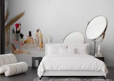 Set of decorative cosmetics and mirrors on dressing table Wall mural