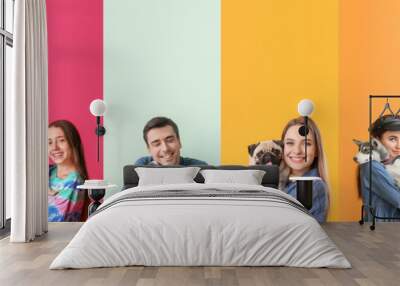 Set of people with cute dogs on colorful background. Friendship Day Wall mural