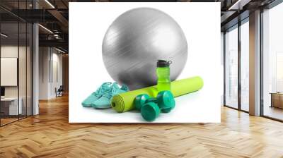 Set of sports equipment with fitness ball, shoes and bottle of water on white background Wall mural