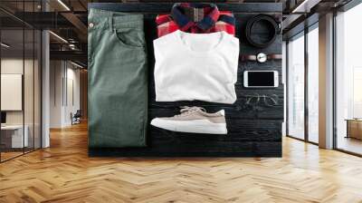 Set of stylish male clothes and accessories on wooden background Wall mural