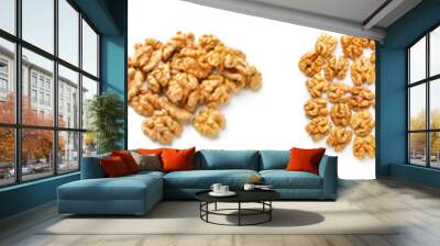 Set of tasty peeled walnuts isolated on white, top view Wall mural