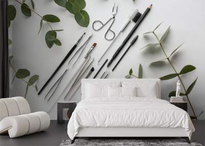 Set of tools for eyebrows correction and tropical branches on white background Wall mural