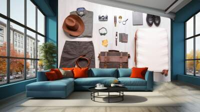 Set of travel accessories for men on wooden background Wall mural