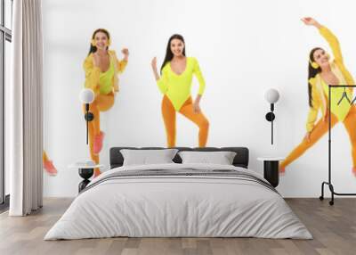 Set of young woman doing aerobics on white background Wall mural