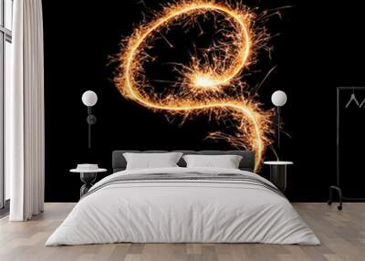 Sparklers forming letter S on dark background Wall mural