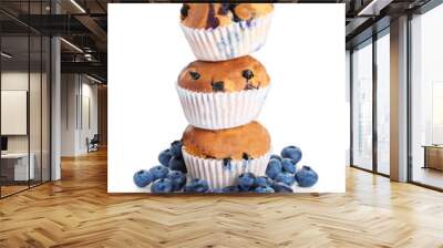 Stack of tasty blueberry muffins on white background Wall mural