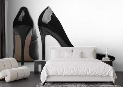 Stylish high-heeled female shoes on white background Wall mural