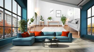 Stylish interior of living room with green houseplants Wall mural