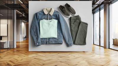 Stylish male clothes with sneakers on grey background Wall mural