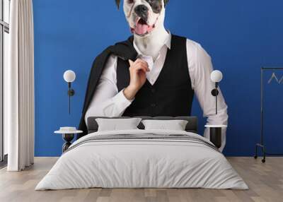 Stylish man with head of dog on color background Wall mural