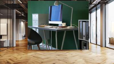 Stylish workplace with computer on table near color wall in office Wall mural