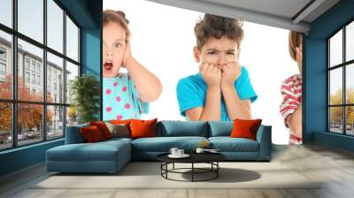 Surprised little boy on white background Wall mural