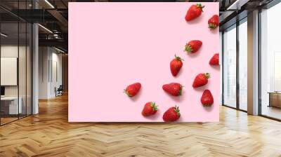 Sweet fresh strawberries on pink background Wall mural