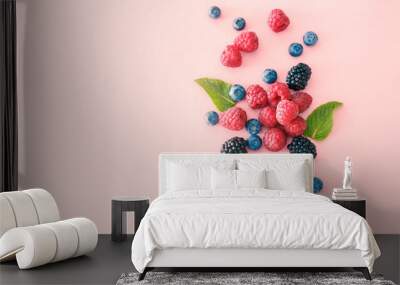 Sweet ripe berries on color background Wall mural