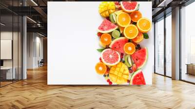 sweet ripe fruits and berries on white background Wall mural