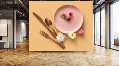 Table setting with beautiful floral decor on beige background Wall mural