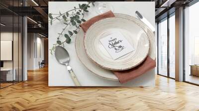 Table setting with eucalyptus branch for Mother's Day celebration on light background Wall mural