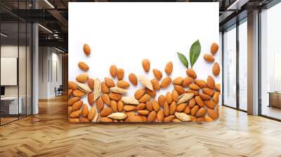 Tasty almonds on white background Wall mural