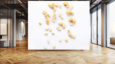 Tasty cashew nuts on white background Wall mural