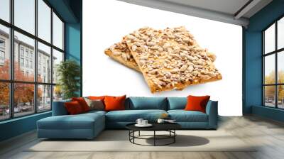 Tasty crackers with seeds on white background Wall mural