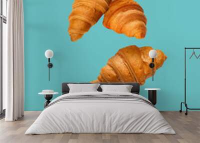 Tasty croissants on color background Wall mural