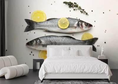 Tasty fresh seabass fish with spices on white background Wall mural